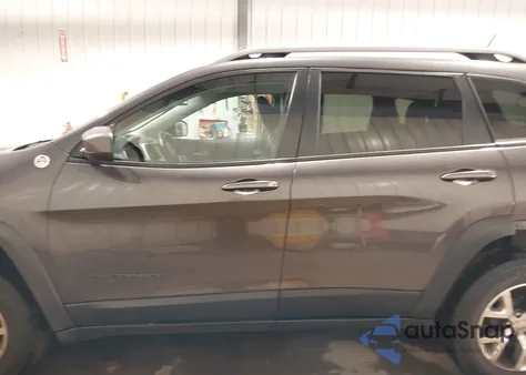 2015 Jeep Cherokee Trailhawk from USA, damaged, VIN 1C4PJMBS7FW772728